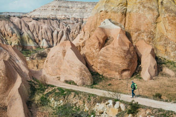 tourist exploring Cappadocia Red and Rose valleys