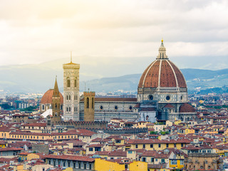 Fototapeta premium Duomo Santa Maria Del Fiore and Bargello in the morning from Piazzale Michelangelo in Florence, Tuscany, Italy. Cathedral Santa Maria del Fiore.