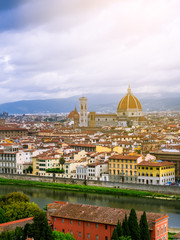 Fototapeta premium Duomo Santa Maria Del Fiore and Bargello in the morning from Piazzale Michelangelo in Florence, Tuscany, Italy. Cathedral Santa Maria del Fiore.