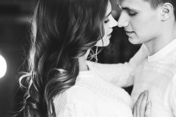 Young couple in love, closeup. Black and white image