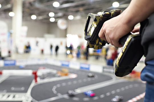 Hand with radio control and competition for model cars