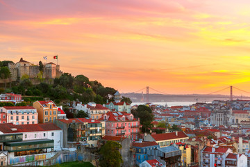 The Castle of Sao Jorge, the historical centre of Lisbon, Tagus River and 25 de Abril Bridge at...