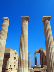 the acropolis and lindos in rhodes with columns and ruins
