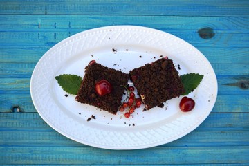 delicious cheesecake with fresh sweet cherries    on a plate