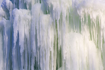 Icicles of ice in the winter of a frozen waterfall 