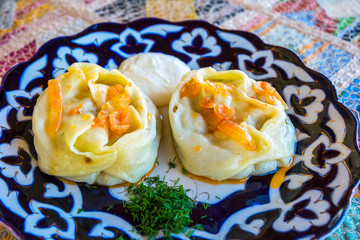 Traditional manty dumplings on the plate