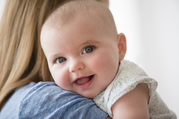 Portrait of baby girl with mother