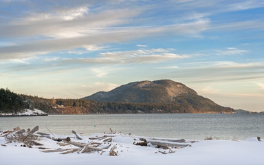 San Juan Islands Snowfall. Fresh snow blankets an island in the Puget Sound area of western Washington State. Lummi Island, Washington.