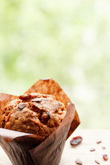 Chocolate muffins in the dark paper.