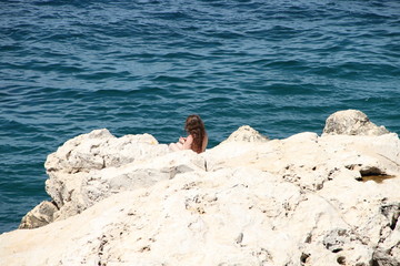 Frau am Meer