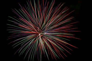 Fototapeta premium Fireworks light up the sky with dazzling display