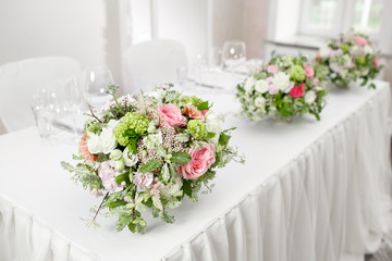 Beautifully organized event - served banquet tables ready for guests