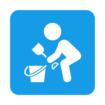 Icono plano ni&ntilde;o con cubo y pala en cuadrado azul