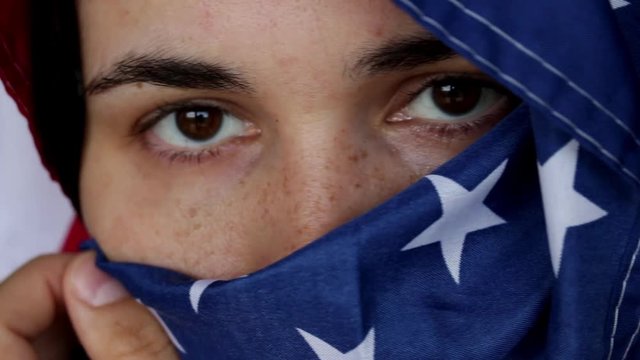 eyes close in american flag hijab