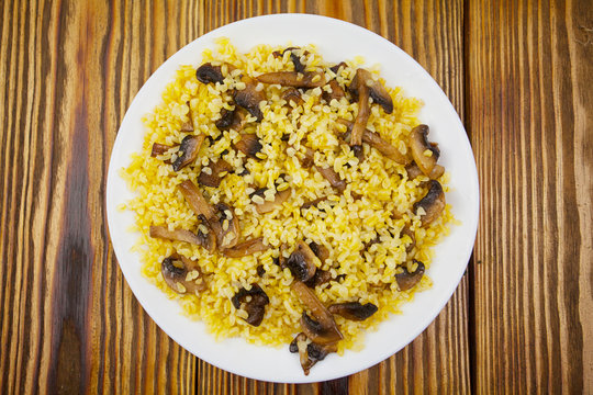 Delicious home made pilaw from wheat on plate