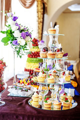 Cakes on a glass hill. The concept of food, party and wedding.