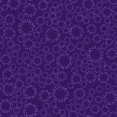 Seamless violet flower mandala for print on textile, fabric, coloring books and abstract backgrounds