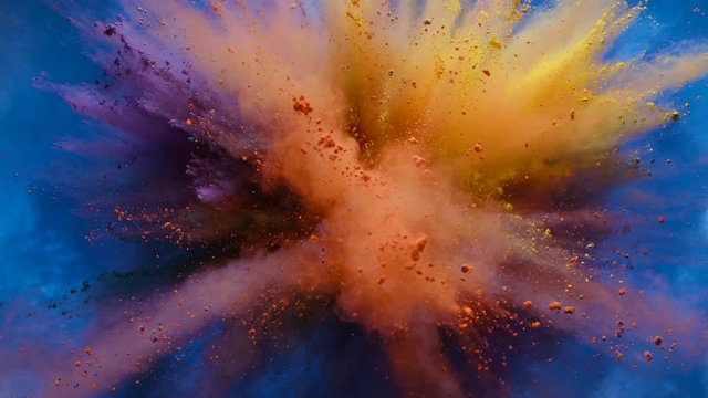 World map made out of colorful powder/particles fly after being exploded. Shot with high speed camera, phantom flex 4K. Slow Motion. 