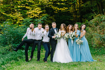 Friends of the newlyweds have a good time at the wedding. Stylish Guests communicate, have fun and...