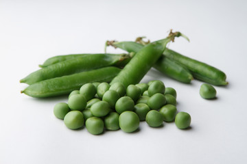 Heap of raw peas isolated on white background