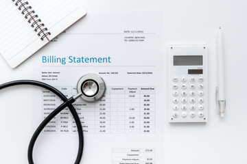 health care billing statement with doctor's stethoscope on white background top view mock-up