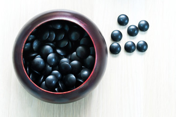 black stone GO in container