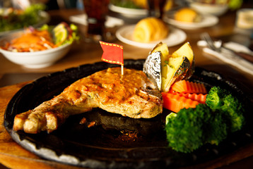 T-bone steak in black plate