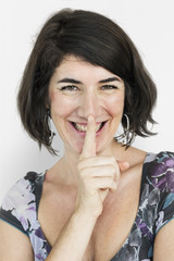 Naklejka premium Caucasian Lady Smiling Hand Gesture Keep Quiet