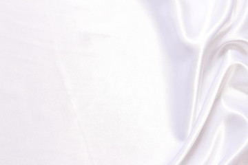 White cloth background abstract with soft waves.