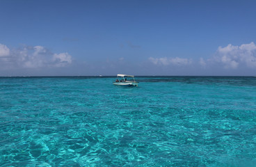 boat alone on sea blue
