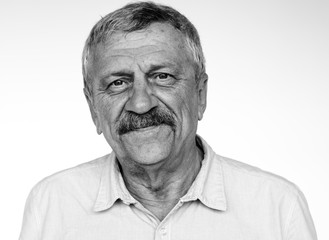Senior adult man smiling casual studio portrait