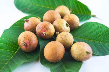  fruit or literally translated as Cat Eye Fruit , a subspecies of the Longan Fruit over white...