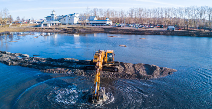 Excavator on water