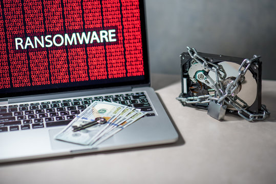 Hard disk file locked with monitor show ransomware cyber attack internet security breaches. Malware lock file concept for security article i.e. WannaCry or WannaCrypt attack all over the world