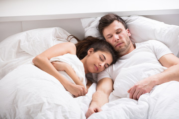 Obraz na płótnie Canvas Sleeping Young Couple