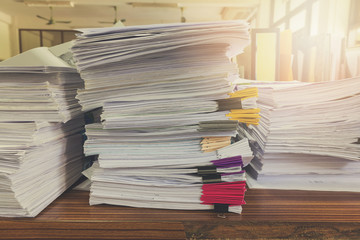 Pile of unfinished documents on office desk, Stack of business paper, Vintage Effect
