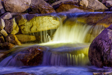 Waterfall with light in the night