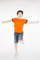 Asian cute child is jumping