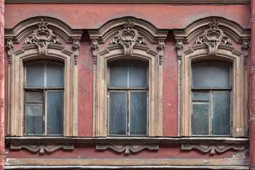 Three windows of the house number 4 before the revolution - the Banking House of Gunzburg, in the Soviet years - LenzhilNIIproekt in the lane Zamyatin, St. Petersburg