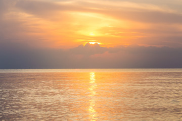 Naklejka na ściany i meble Reflection of sunlight on the sea, sunrise in the sea