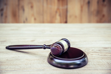 Wooden judge gavel and soundboard .