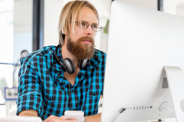 Young man working in office