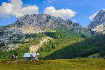 View of family farm on countryside near Rikavacko lake in Komovi mountains, Montenegro