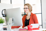 Young woman in office