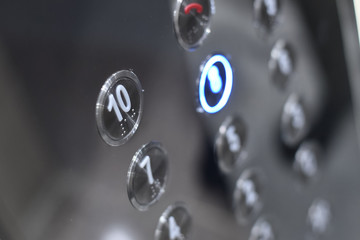 Elevator interior with modern design and pressing elevator buttons