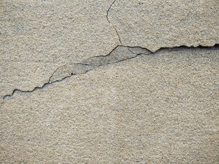 Obraz premium Old wall with large cracks and texture background