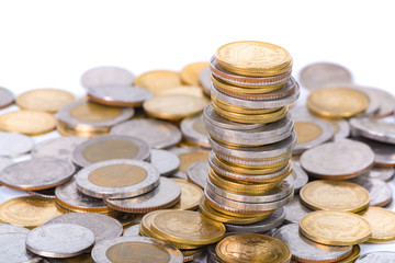 Columns of coins, piles of coins on white background