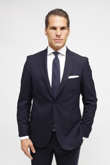 Fototapeta premium man with dark suit and dark tie