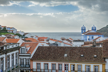 Obraz premium Church, roofs and ocean in Angra do Heroismo, Island of Terceira, Azores