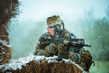 sniper with automatic rifle . airsoft